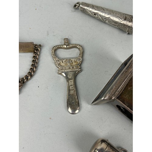 275 - A GROUP OF SIX SILVER ITEMS TO INCLUDE BOTTLE OPENER (6) Total silver weight: 180gms