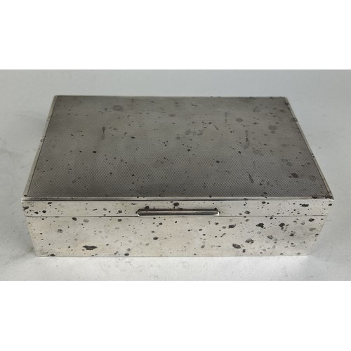 274 - A SILVER CIGARETTE BOX With aesthetic mottled patina. 16.5cm x 10cm x 5cm