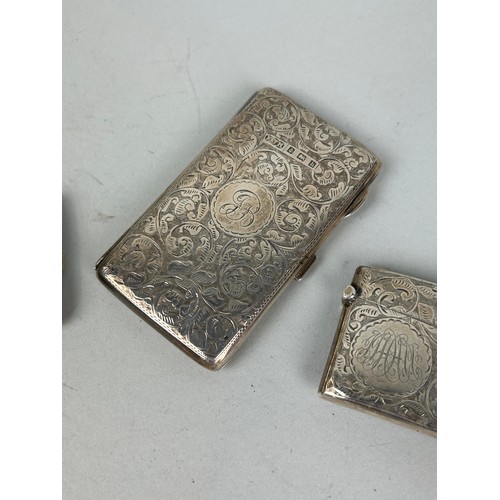 276 - FIVE SILVER VESTA CASES / CIGARETTE CASES Total weight:150gms Four with chased foliate design.