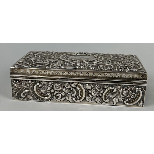 281 - A SILVER CIGARETTE BOX WITH FLORAL REPOUSSE DESIGN 18cm x 9cm x 5cm