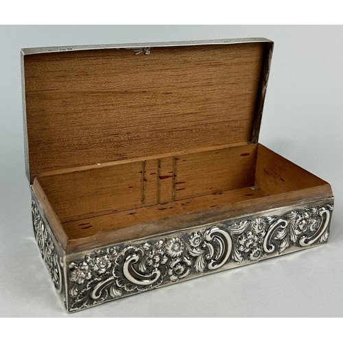 281 - A SILVER CIGARETTE BOX WITH FLORAL REPOUSSE DESIGN 18cm x 9cm x 5cm