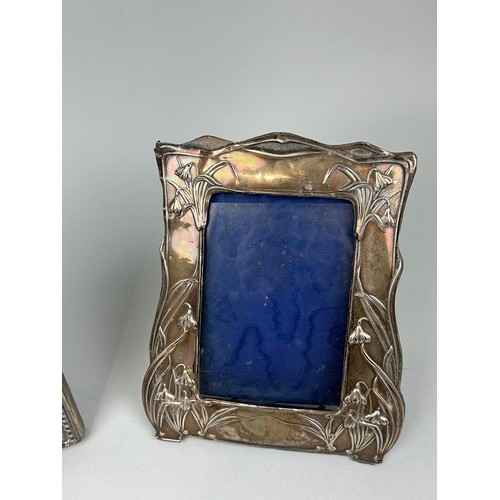 308 - THREE SILVER PICTURE FRAMES ONE ARTS AND CRAFTS Largest 29cm x 22cm (back needs repair to be used pr... 