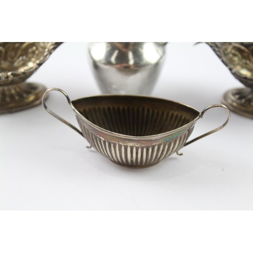 324 - FOUR .925 STERLING SILVER CONDIMENT DISHES AND CREAM JUG (4)

Weight: 83gms