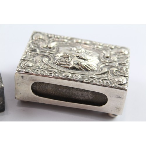 341 - TWO .925 STERLING SILVER MATCHBOX CASES/ COVERS INCLUDING CHERUBS (2)

Weight: 73gms