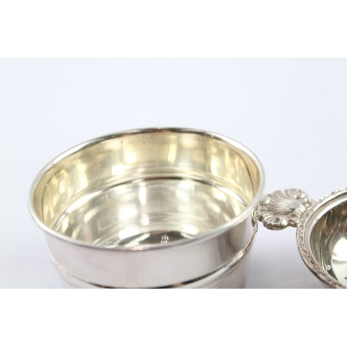 346 - A .925 STERLING SILVER TEA STRAINER & BOWL

Total weight: 86gms