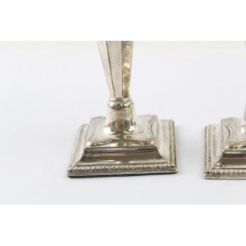 366 - A PAIR OF VINTAGE .925 STERLING SILVER FILLED CANDLESTICKS