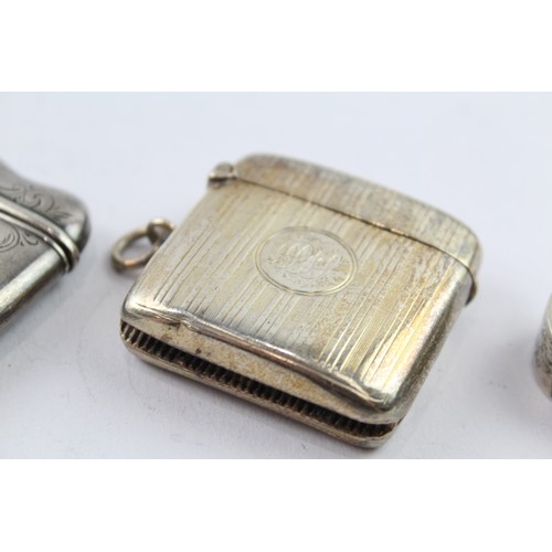 371 - THREE .925 STERLING SILVER VESTAS AND SNUFF BOX

Weight: 75gms