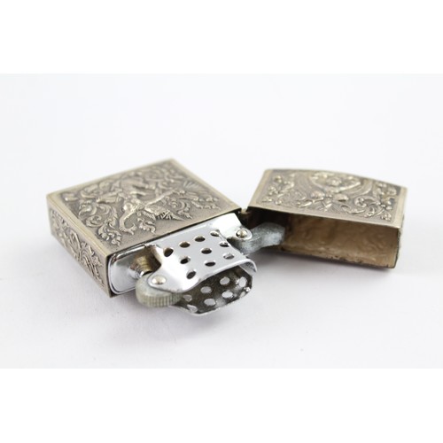 378 - A SIAM SILVER CASED CIGARETTE LIGHTER

Weight: 52gms