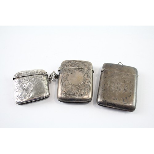 379 - THREE STERLING SILVER VESTA/MATCH CASES INCLUDING EDWARDIAN

Weight: 74gms