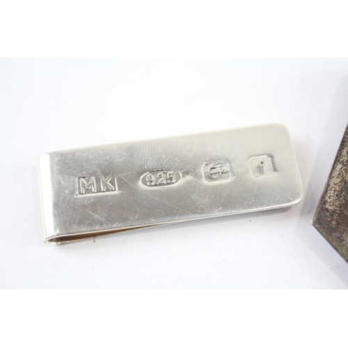 394 - TWO .925 STERLING SILVER GENTS MONEY CLIPS (2)

Weight: 32gms