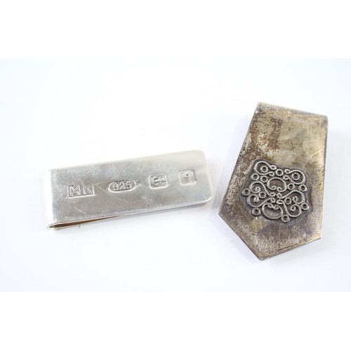 394 - TWO .925 STERLING SILVER GENTS MONEY CLIPS (2)

Weight: 32gms