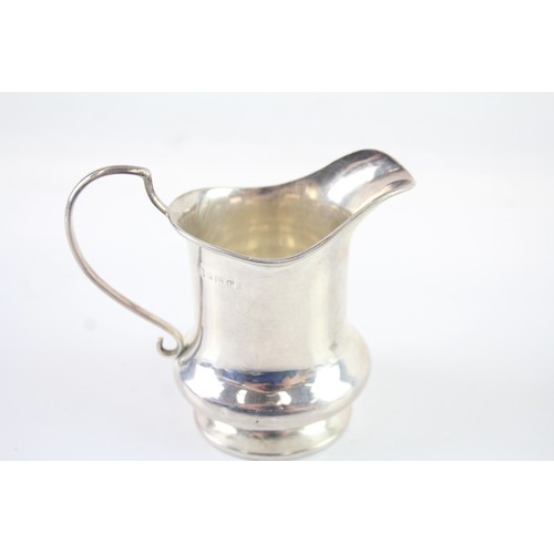 406 - A .925 STERLING SILVER CREAM JUG

Weight: 76gms