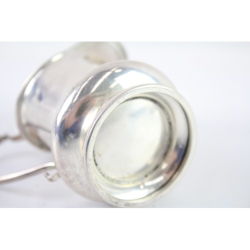 406 - A .925 STERLING SILVER CREAM JUG

Weight: 76gms