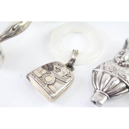 405 - FOUR .925 STERLING SILVER BABY RATTLES

Weight: 49gms