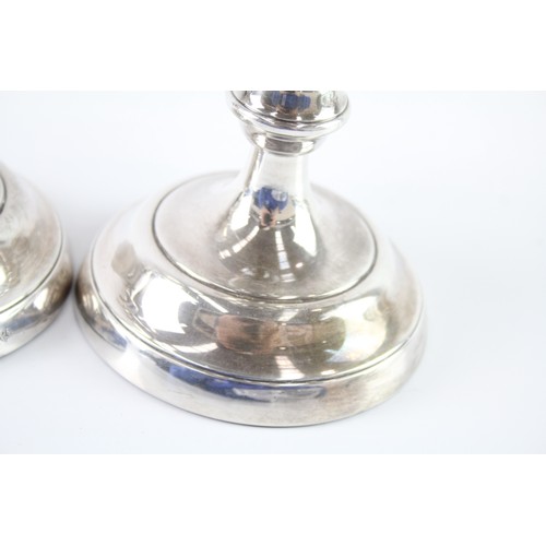 412 - A PAIR OF VINTAGE .925 STERLING SILVER FILLED CANDLESTICKS