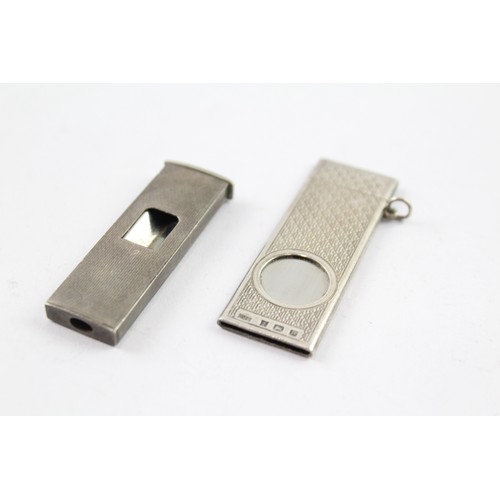 416 - TWO .925 STERLING SILVER CIGAR CUTTERS Weight: 38gms