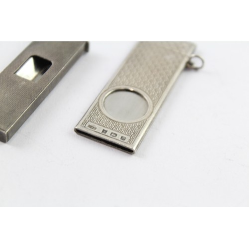 416 - TWO .925 STERLING SILVER CIGAR CUTTERS Weight: 38gms