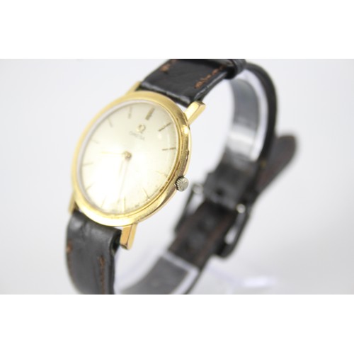 444 - A MEN'S VINTAGE OMEGA GOLD TONE WATCH Hand wound In working order