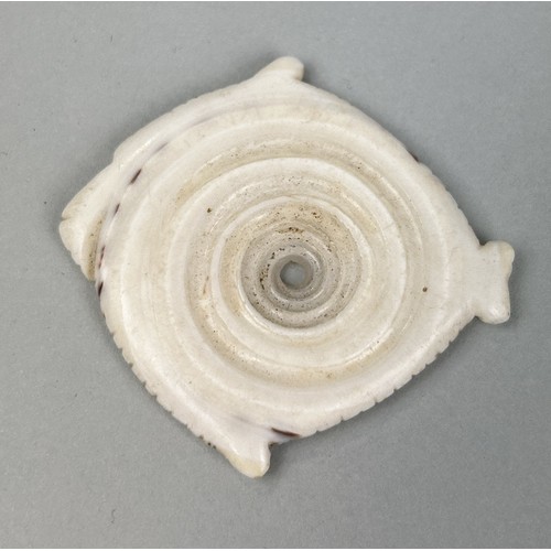 459 - AN ANTIQUE TRIBAL CARVED SHELL 'FISH' PENDANT PROBABLY SOUTH SEA ISLANDS 5.2cm x 5cm Collected by Ca... 