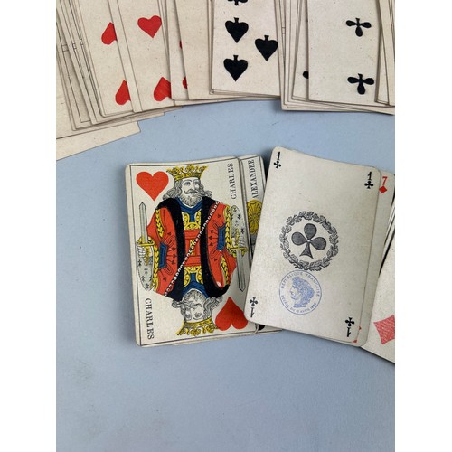 469 - THREE PACKS OF SPANISH PLAYING CARDS, WITH TWO HANDWRITTEN LABELS ONE DATED 1837 One pack with handw... 