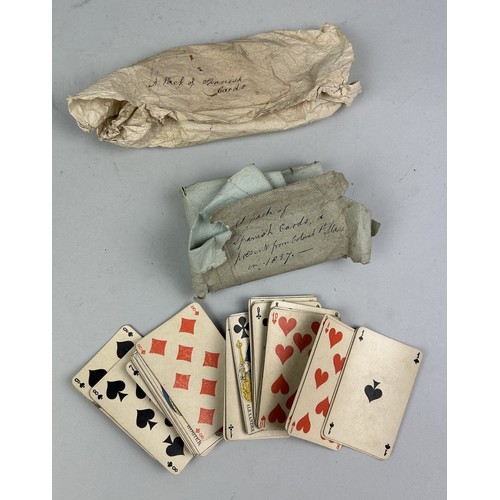 469 - THREE PACKS OF SPANISH PLAYING CARDS, WITH TWO HANDWRITTEN LABELS ONE DATED 1837 One pack with handw... 