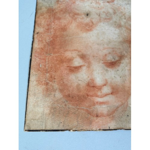 516 - CIRCLE OF CRISTOFORO RONCALLI (ITALIAN 1552-1626): A RED CHALK DRAWING OF A CHILD'S FACE 26cm x 20cm