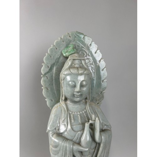 599A - A LARGE CHINESE JADE FIGURE OF THE GUANYIN 63cm H