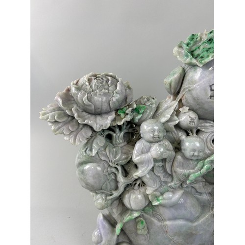 600 - A LARGE CHINESE JADE SCULPTURE DEPICTING FIGURES WITH FRUIT AND FOLIAGE 43cm x 43cm