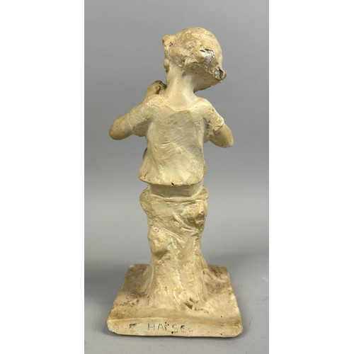 604 - A PLASTER CAST MODEL OF PETER PAN, SIGNED 'HALSE' Old repairs 24cm H