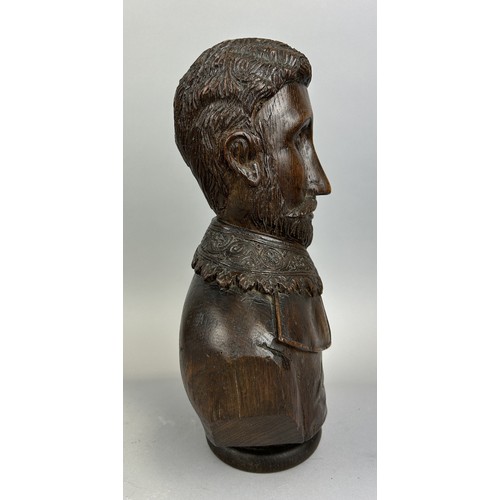 610 - AN ANTIQUE CARVED WOODEN BUST OF A GENTLEMAN 32cm x 22cm