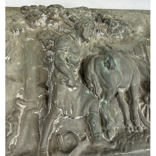 606 - A CAST BRONZE FRIEZE DEPICTING FIGURES WITH A HORSE 38cm x 24cm