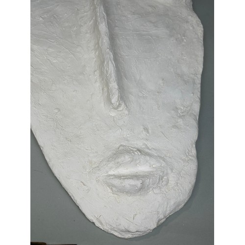 611A - A WALL SCULPTURE BY PHILLIPE VALENTIN (20TH C.) Plaster and metallic sculpture of a face 77 x 48 cm