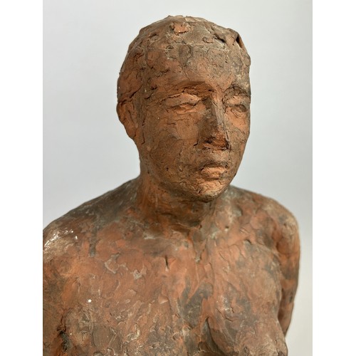 613 - A TERRACOTTA SCULPTURE DEPICTING A NUDE LADY 43cm x 20cm