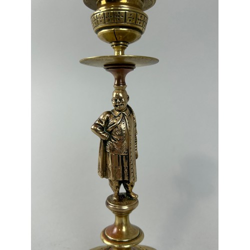 635 - A PAIR OF 19TH CENTURY CHINOISERIE FIGURAL BRASS CANDLESTICKS 20cm H