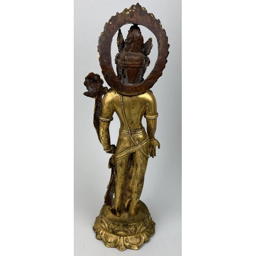 627 - A GILT BRONZE BUDDHIST SCULPTURE DEPICTING AVALOKITESUARA 33cm H