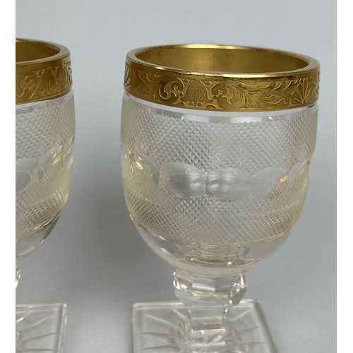 634 - A PAIR OF MOSER GERMAN CRYSTAL GLASSES WITH HIGHT CARAT GOLD GILDING 16cm H each.