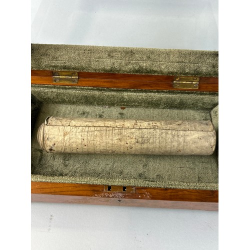 643 - A JEWISH SCROLL 270cm x 21cm With walnut veneer case with glass lid.