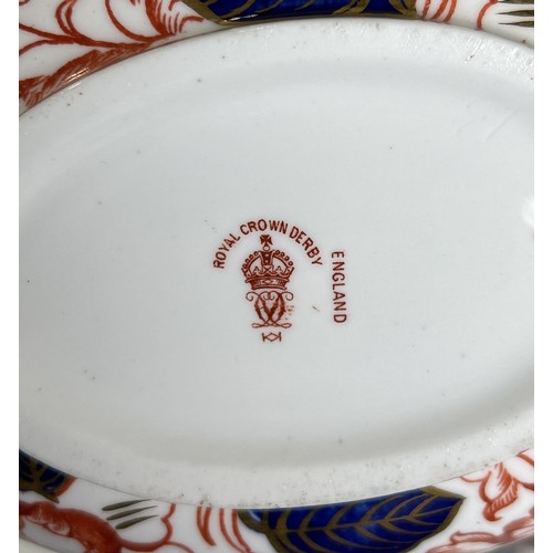 661 - ROYAL CROWN DERBY: A CHINA TEA SET FOR FOUR