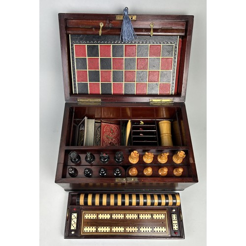 684 - AN EARLY VICTORIAN MAHOGANY BOXED GAMES COMPENDIUM WITH STAUNTON CHESS PIECES

With chess (staunton ... 