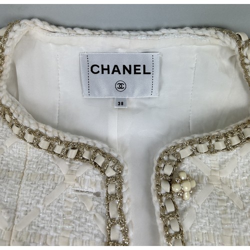 702 - A VINTAGE CHANEL STYLE SILK-LINED EVENING JACKET