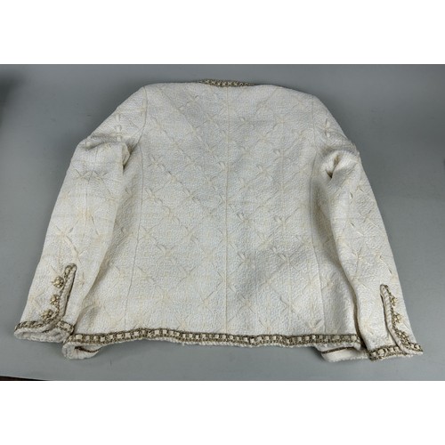 702 - A VINTAGE CHANEL STYLE SILK-LINED EVENING JACKET