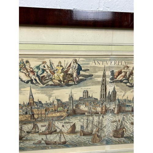 822 - A LARGE HAND COLOURED ENGRAVING OF ANTWERP POSSIBLY 17TH CENTURY 145cm x 31cm Framed and glazed.