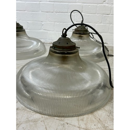 1000 - A SET OF FOUR INDUSTRIAL LAMPS 36cm width each.