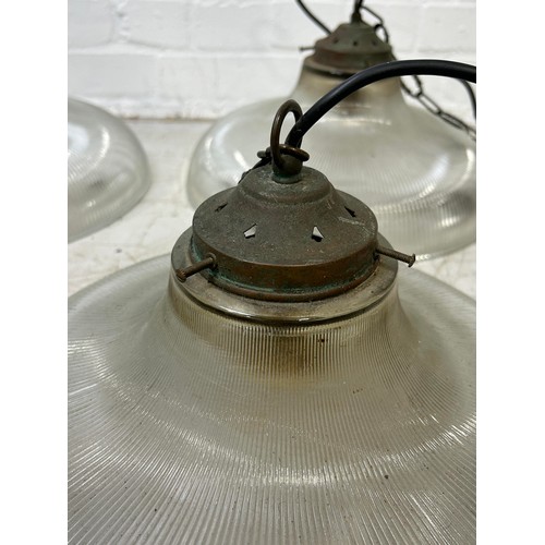 1000 - A SET OF FOUR INDUSTRIAL LAMPS 36cm width each.