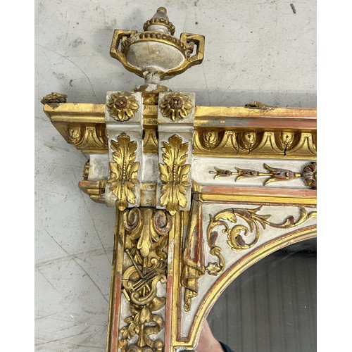 1021 - A LARGE FRENCH NEOCLASSICAL GILT WOOD WALL MIRROR WITH CLASSICAL URNS, ROUNDELS, MUSICAL INSTRUMENTS... 