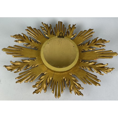 1042 - A GARRARD AND CO GILT WOOD SUNBURST WALL CLOCK 63cm x 46cm