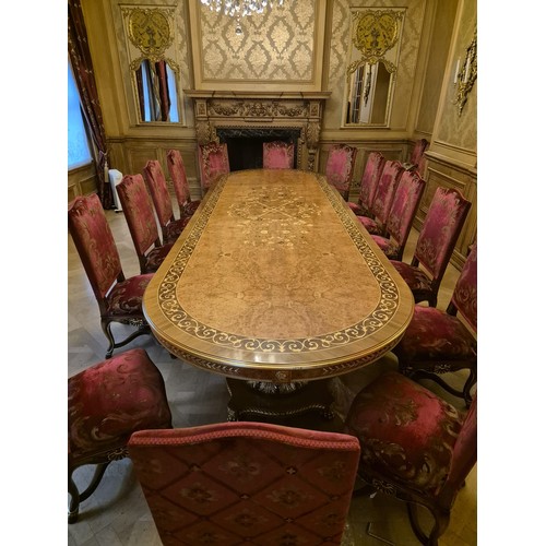 1055D - PROPERTY FROM THE QATAR EMBASSY: A LARGE DINING TABLE WITH MARQUETRY INLAY ALONG WITH FIFTEEN CHAIRS... 