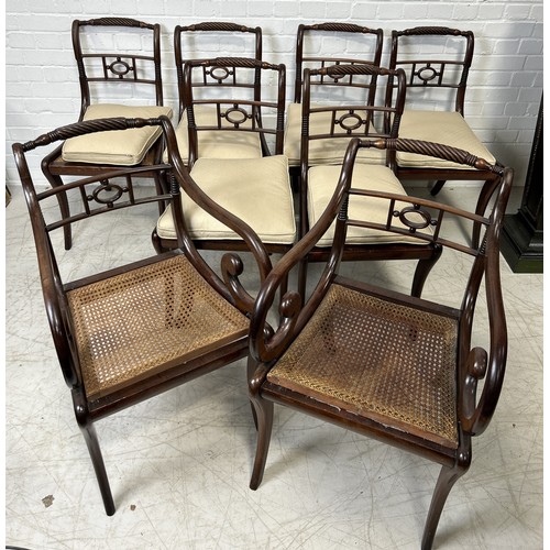 1079 - A SET OF EIGHT REGENCY MAHOGANY DINING CHAIRS WITH CANE SEATS TO INCLUDE TWO CARVERS (8) The side ch... 