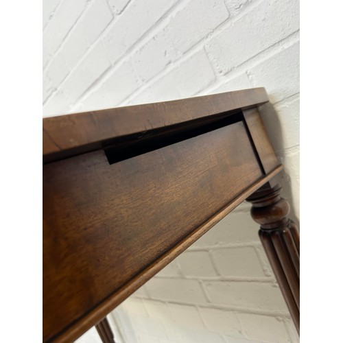 1092 - A VICTORIAN MAHOGANY DESK IN THE MANNER OF GILLOWS 85cm x 72cm x 54cm With single sliding drawer and... 