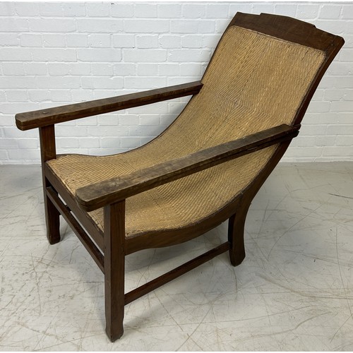 1094 - A LARGE PLANTATION ARMCHAIR WITH CANED SEAT AND BACK 107cm x 92cm x 60cm